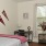 bedroom with bed and wall art