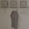 closet with hangers and bags on shelf