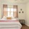 bedroom with bed and large window